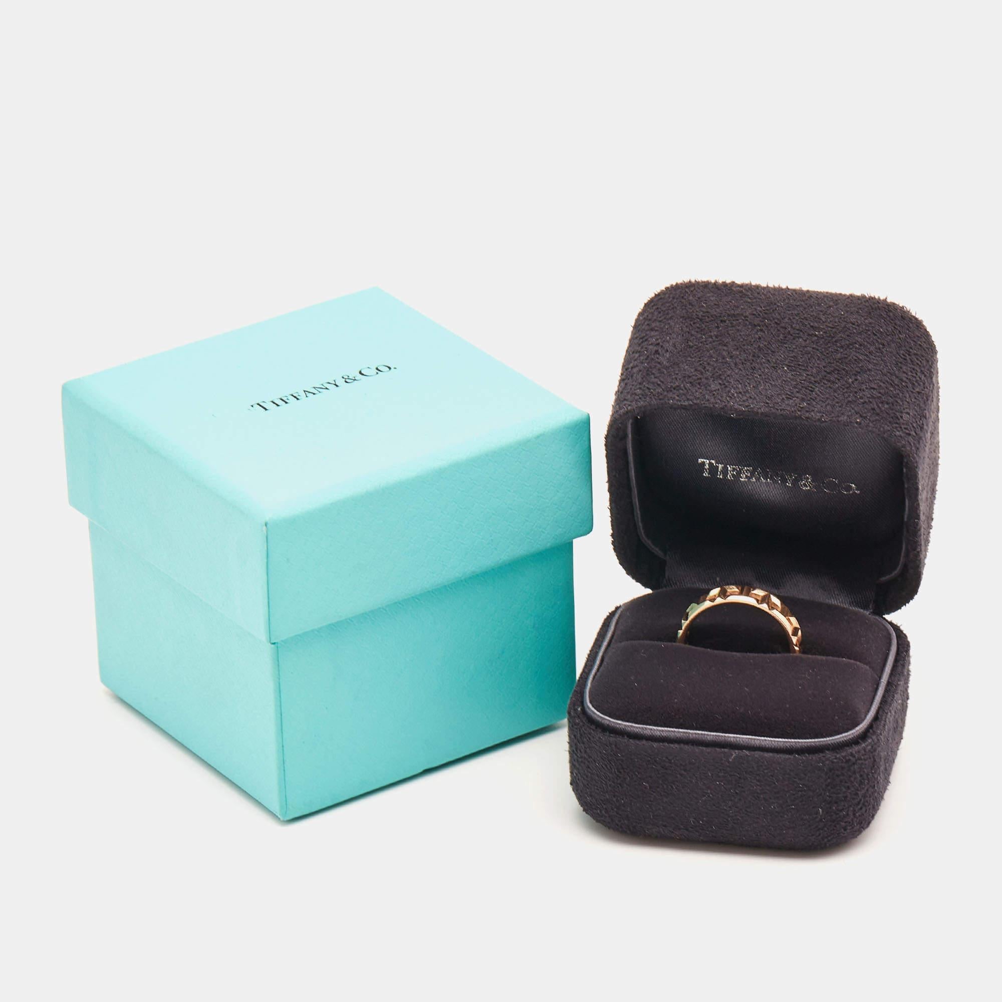 The Tiffany T collection is one of the most popular jewelry lines from Tiffany & Co. Each piece comes with a distinct shape that displays or re-interprets the 'T' symbol. This Tiffany T True wide ring is made of 18k rose gold and the design is