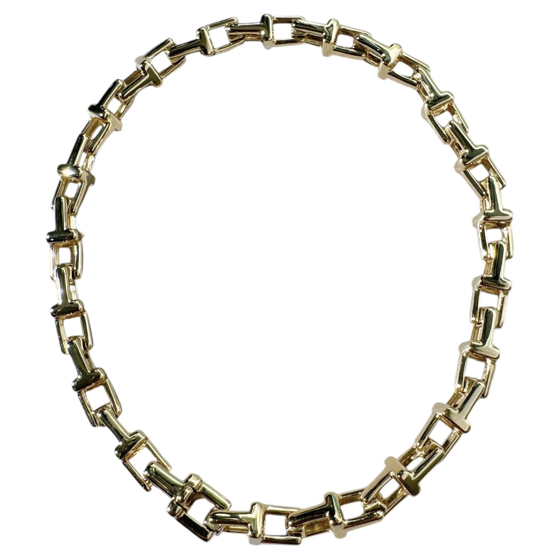 Tiffany & Co. Pulsera «T True Narrow Interlock» de Tiffany T, en oro rosa de 18 quilates