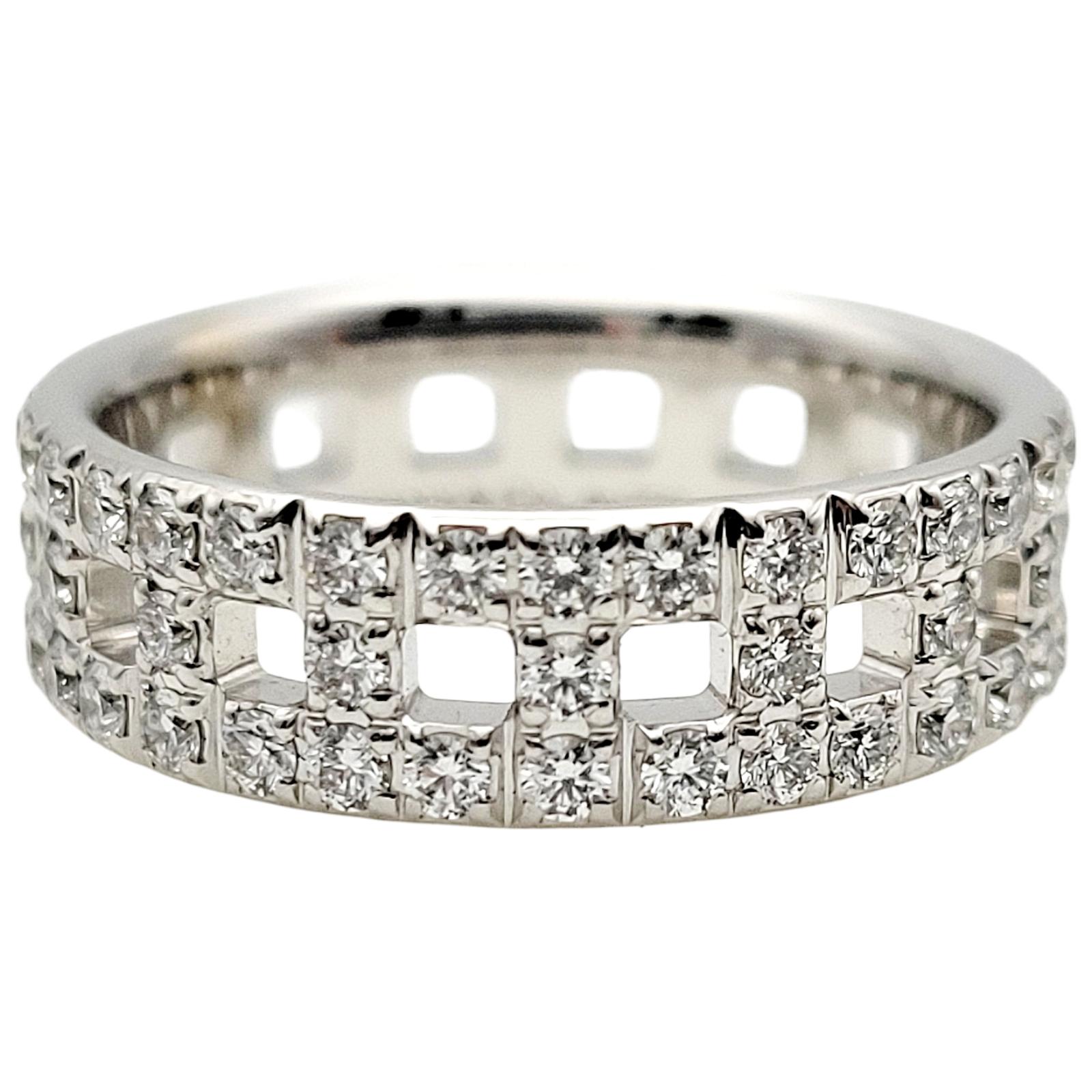 Ring size: 6

Introducing a stunning Tiffany & Co. True Wide Diamond ring in 18-karat white gold from the Tiffany T Collection. Founded in 1837 in New York City, Tiffany & Co. is one of the world's most storied luxury design houses recognized