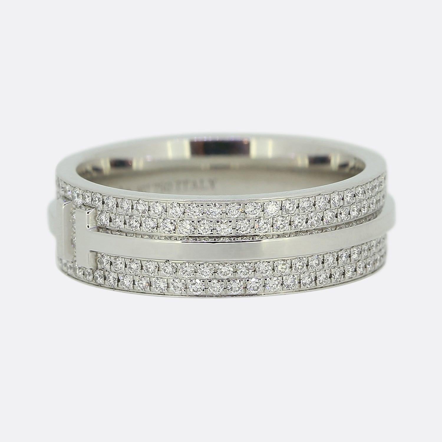 Here we have an iconic piece of jewellery from Tiffany & Co. This ring has been crafted from 18ct white gold and forms part of the T Tiffany collection with bold lines highlighting the powerful form of the letter 'T' which wraps around the entire