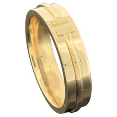 Tiffany & Co. Anillo ancho Tiffany T de oro amarillo de 18k, 5,5 mm, talla 9, 3100 $