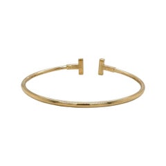 Tiffany & Co. T Wire Bangle in 18k Yellow Gold with Diamonds