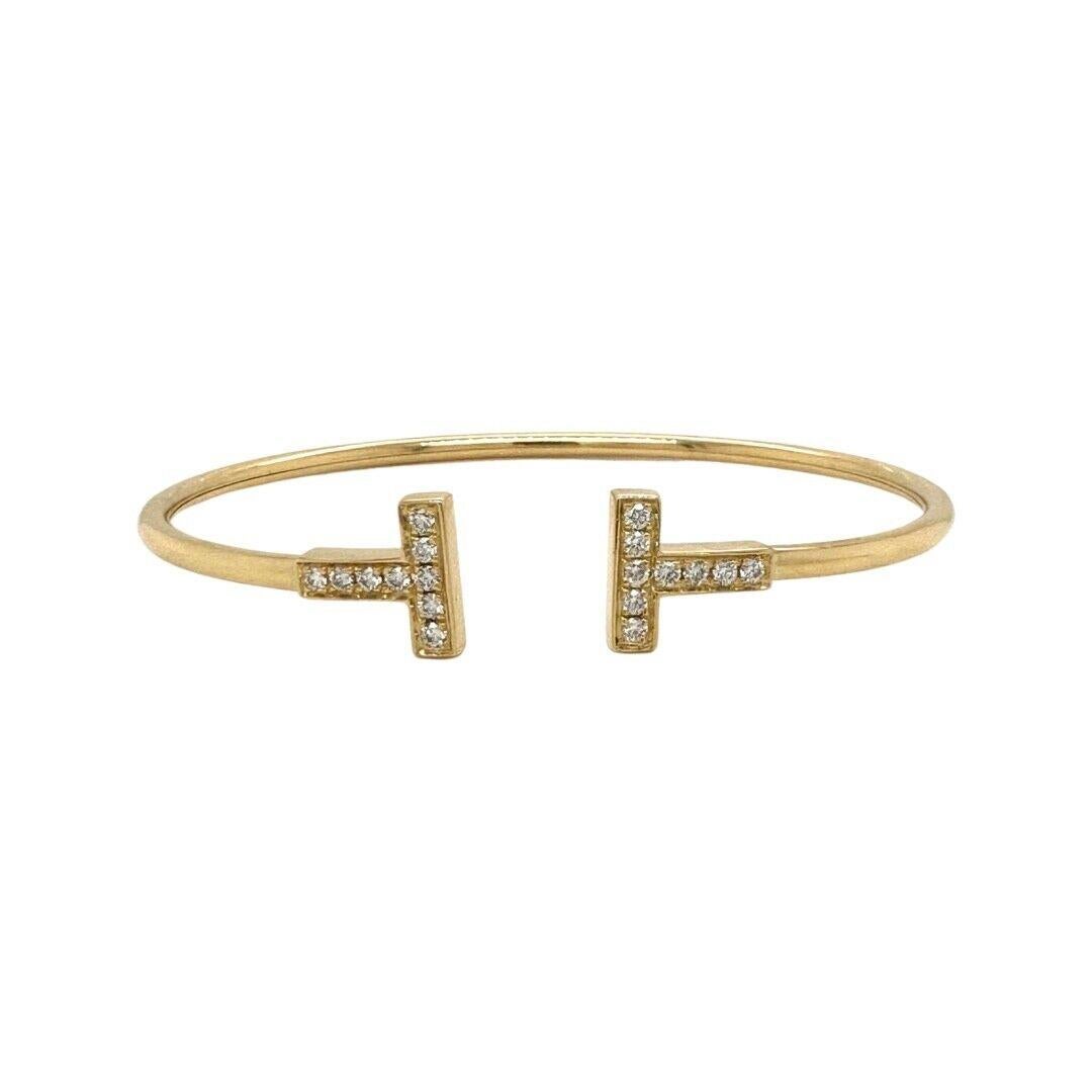 Tiffany & Co. T Wire Bangle in 18k Yellow Gold with Diamonds In Excellent Condition In Miami, FL