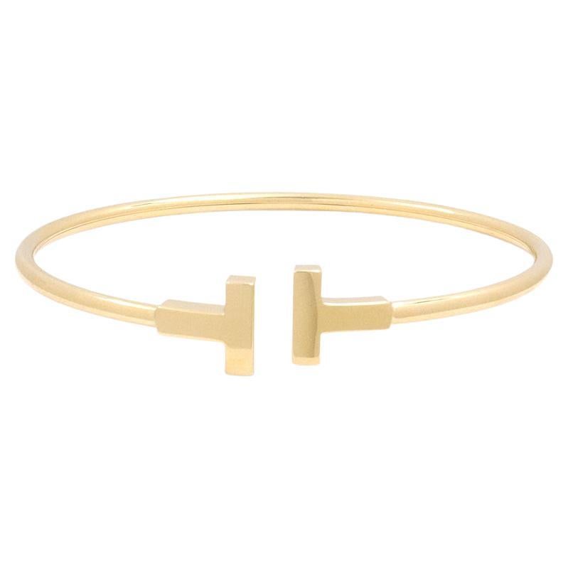 Tiffany and Co. 'Tiffany T' Yellow Gold Wire Bracelet at 1stDibs | tiffany  t wire bracelet weight, tiffany wire bracelet, tiffany's t bracelet
