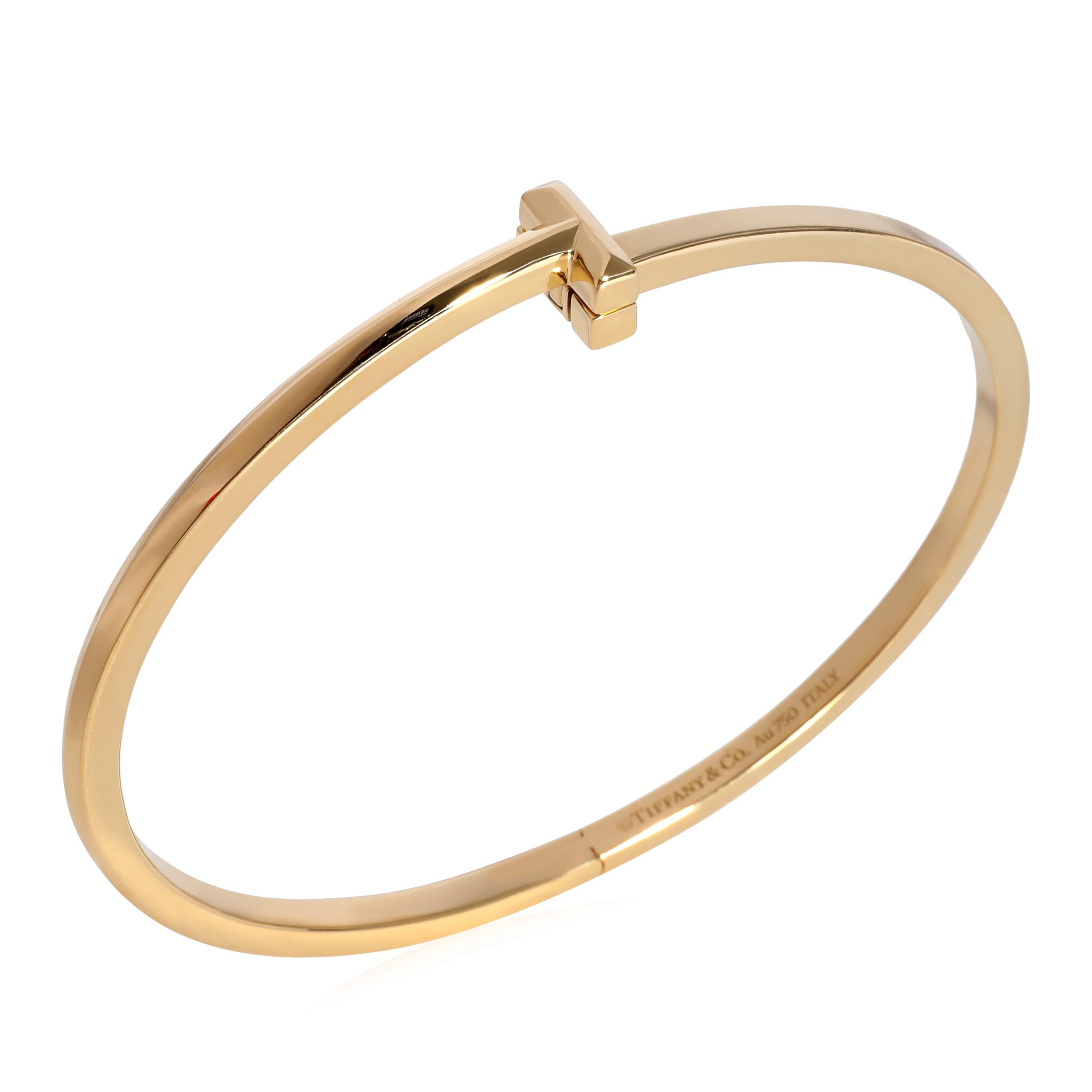 Tiffany & Co. Tiffany T1 Narrow Hinged Bangle in 18k Yellow Gold

PRIMARY DETAILS
SKU: 123504
Listing Title: Tiffany & Co. Tiffany T1 Narrow Hinged Bangle in 18k Yellow Gold
Condition Description: Retails for 4200 USD. In excellent condition and