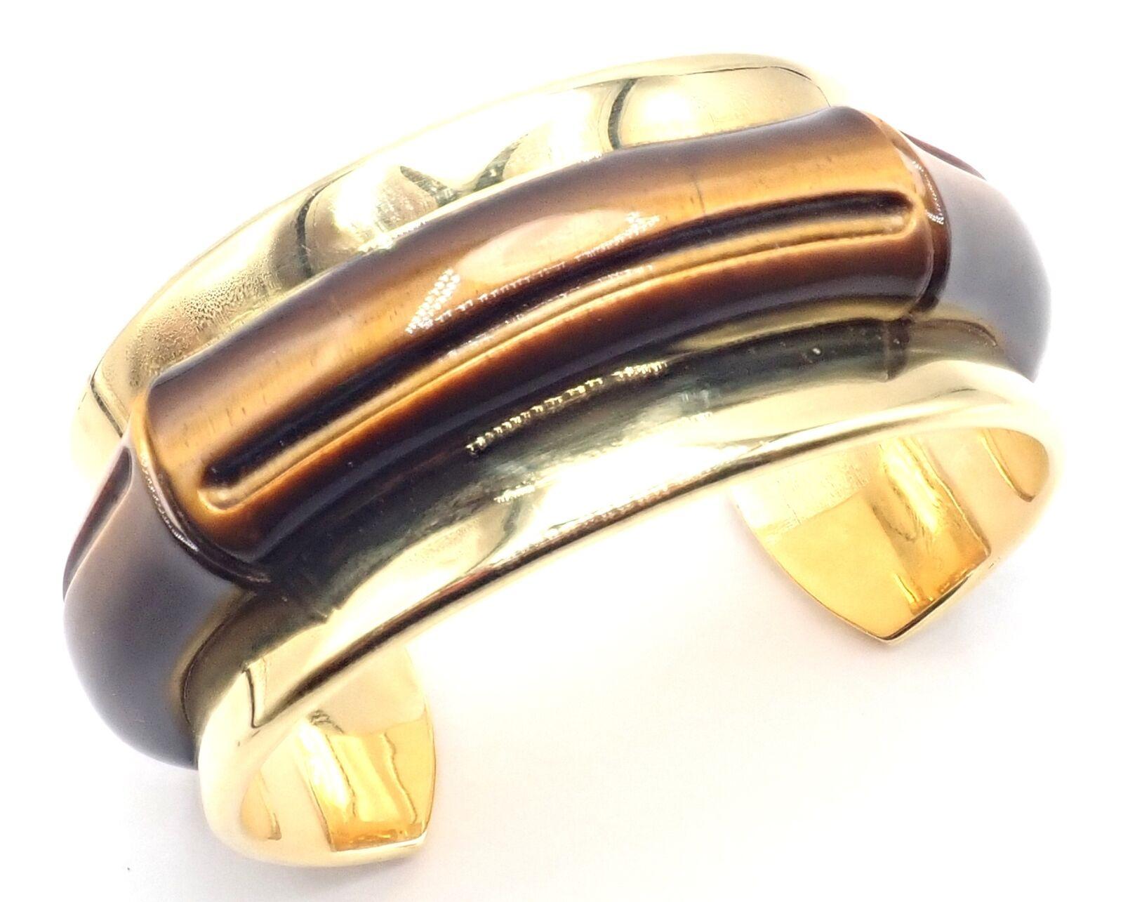 Tiffany & Co Tiger's Eye Bangle Cuff Wide Yellow Gold Bracelet In Excellent Condition For Sale In Holland, PA