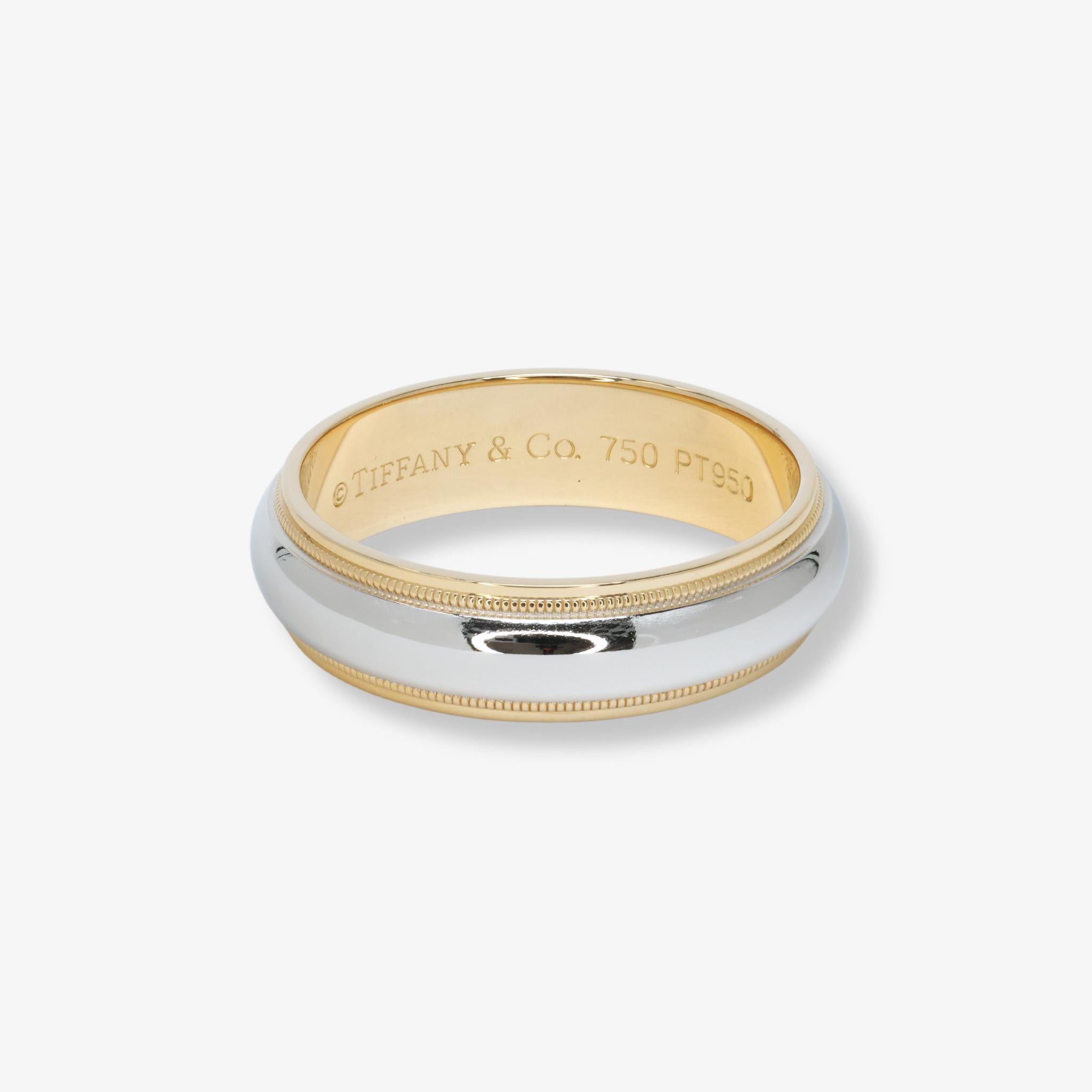 Tiffany & Co. Together Milgrain 6mm Wedding Band Platinum & 18 Karat Yellow Gold

Celebrate your commitment with this distinguished Tiffany & Co. Wedding Band, expertly crafted from a luxurious blend of platinum and 18k yellow gold.

Metal: Crafted
