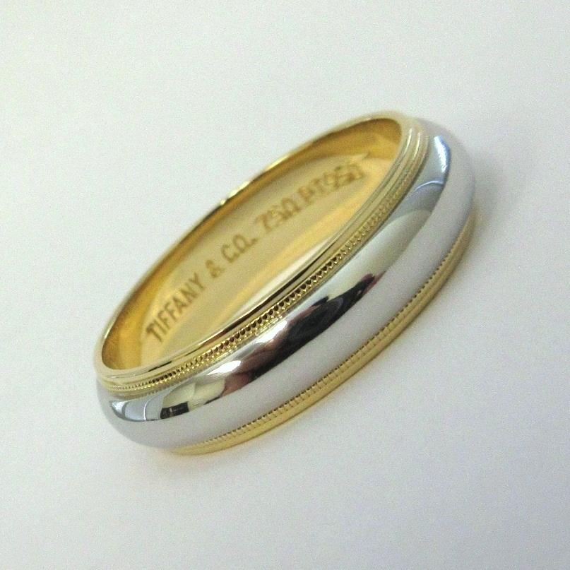 TIFFANY & Co. Juntos Platino 18K Oro 6mm Milgrain Alianza 11

Metal: Platino y oro amarillo de 18 quilates
Tamaño: 11
Ancho de banda: 6 mm
Peso: 10,70 gramos 
Sello: TIFFANY&CO. 750 PT950
Estado: Excelente estado

Autenticidad garantizada