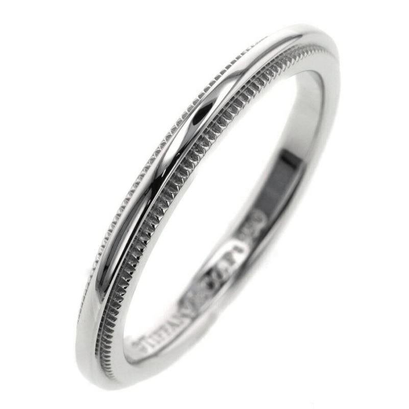 TIFFANY & Co. Together Platinum 2mm Milgrain Wedding Band Ring 7.5

Metal: Platinum 
Size: 7.5
Band Width: 2mm
Weight: 3.70 grams 
Hallmark: ©TIFFANY&CO. Pt950 
Condition: Excellent condition, like new

Authenticity Guaranteed 