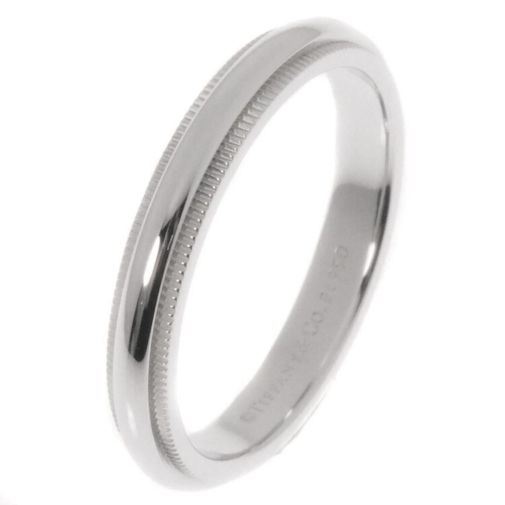 TIFFANY & Co. Together Platinum 3mm Milgrain Wedding Band Ring 7

Metal: Platinum 
Size: 7
Band Width: 3mm
Weight: 5.80 grams 
Hallmark: ©TIFFANY&CO. PT950 
Condition: Excellent condition, like new 
Tiffany price: $1,500

Authenticity Guaranteed 