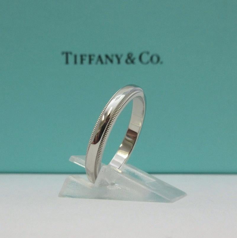 TIFFANY & Co. Together Platinum 3mm Milgrain Wedding Band Ring 7.5

Metal: Platinum 
Size: 7.5
Band Width: 3mm
Weight: 5.90 grams 
Hallmark: TIFFANY&CO. PT950 
Condition: Excellent condition, like new
Tiffany Price: $1,500

Authenticity guaranteed 
