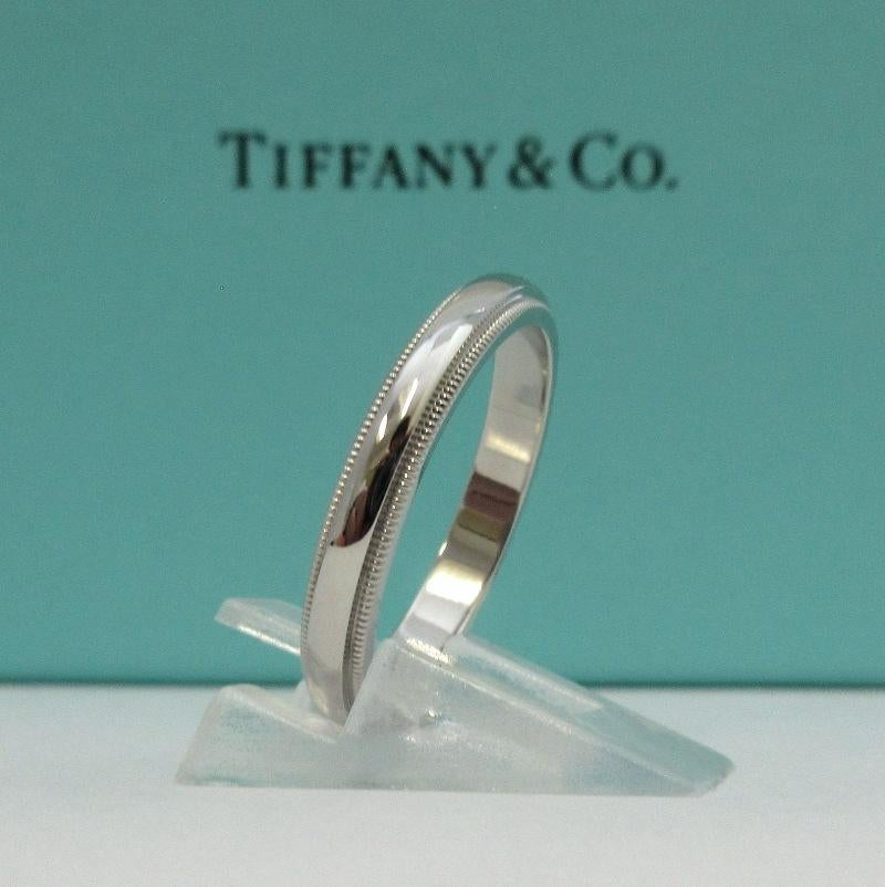 TIFFANY & Co. Together Platinum 3mm Milgrain Wedding Band Ring 8

Metal: Platinum 
Size: 8
Band Width: 3mm
Weight: 6.0 grams 
Hallmark: TIFFANY&CO. PT950 
Condition: Excellent condition, like new, comes with Tiffany pouch and box
Tiffany Price: