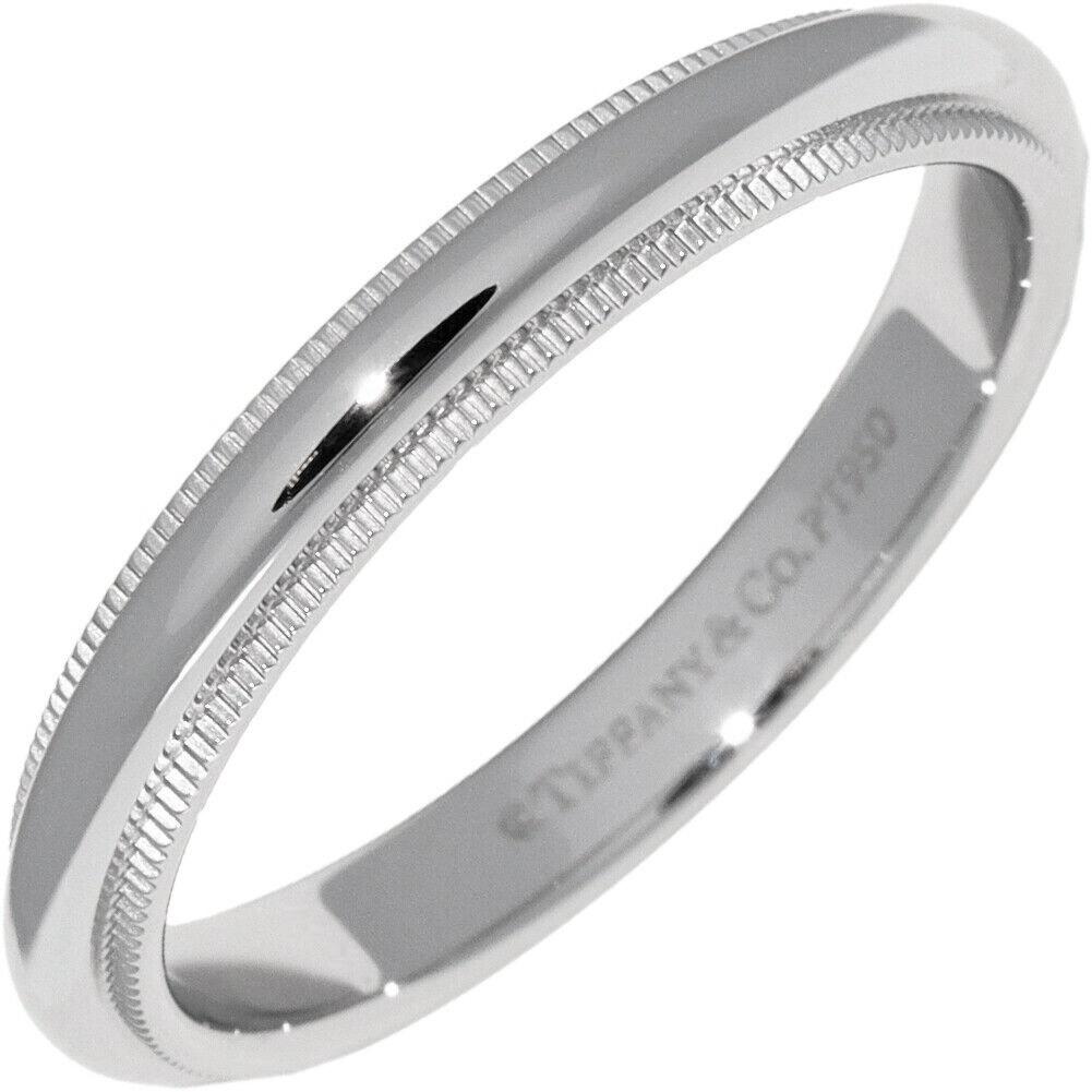 TIFFANY & Co. Together Platinum 3mm Milgrain Wedding Band Ring 8.5

Metal: Platinum 
Size: 8.5
Band Width: 3mm
Weight: 5.60 grams 
Hallmark: ©TIFFANY&CO. PT950 
Condition: Excellent condition, like new
Tiffany Price: $1,500

Authenticity Guaranteed 