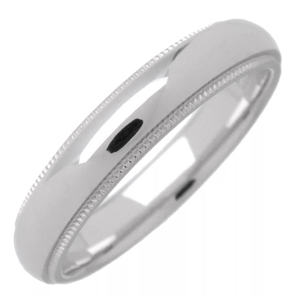 TIFFANY & Co. Together Platinum 4mm Milgrain Wedding Band Ring 8

Metal: Platinum
Size: 8 
Band Width: 4mm
Weight: 7.50 grams
Hallmark: TIFFANY&Co. PT50
Condition: Excellent condition, like new
Tiffany Price: $2,100

Authenticity Guaranteed 