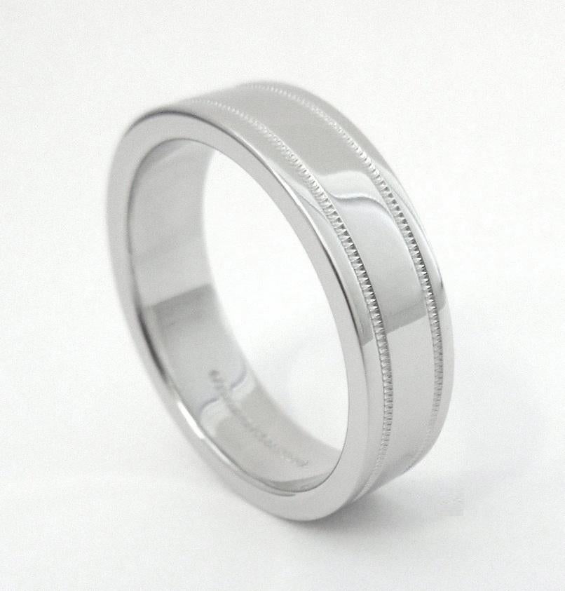 TIFFANY & Co. Together Platinum 6mm Double Milgrain Wedding Band Ring 10

 Metal: Platinum 
 Size: 10 
 Band Width: 6mm
 Weight: 14.60 grams
 Hallmark: ©TIFFANY&CO. PT950
 Condition: Excellent condition, like new
 Tiffany price: $2,950

Authenticity