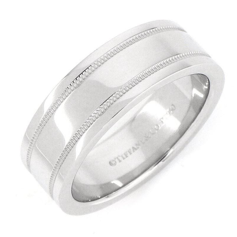 TIFFANY & Co. Juntos Platino 6mm Doble Milgrain Alianza 7

 Metal: Platino 
 Tamaño: 7
 Ancho de banda: 6 mm
 Sello: ©TIFFANY&CO. PT950 
 Estado: Excelente estado, como nuevo
 Precio Tiffany: 2,850 dólares

Autenticidad garantizada