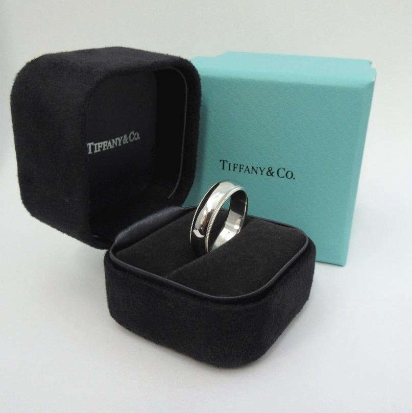 TIFFANY & Co. Together Platinum 6mm Milgrain Wedding Band Ring 9

 Metal: Platinum 
 Size: 9 
 Band Width: 6mm
 Weight: 14.10 grams
 Hallmark: ©TIFFANY&CO. PT950

Authenticity Guaranteed
