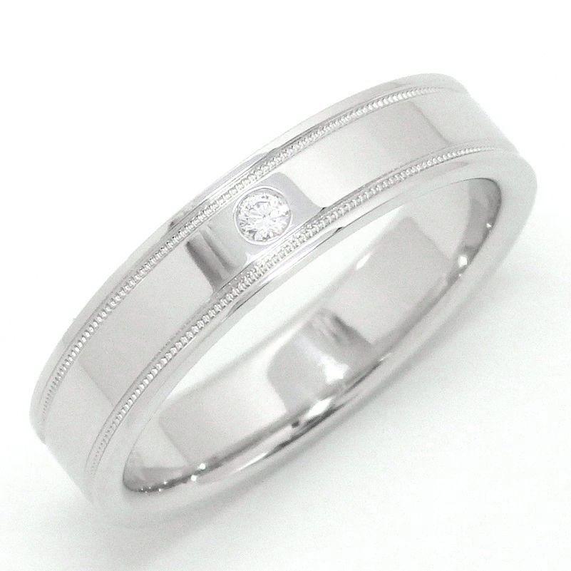 TIFFANY & Co. Together Platinum Diamond 4mm Double Milgrain Band Ring 7.5

 Metal: Platinum 
 Size: 7.5 
 Band Width: 4mm
 Weight: 6.70 grams
 Diamond: One round brilliant diamond, carat total weight .01
 Hallmark: ©TIFFANY&CO. PT950 
 Condition:
