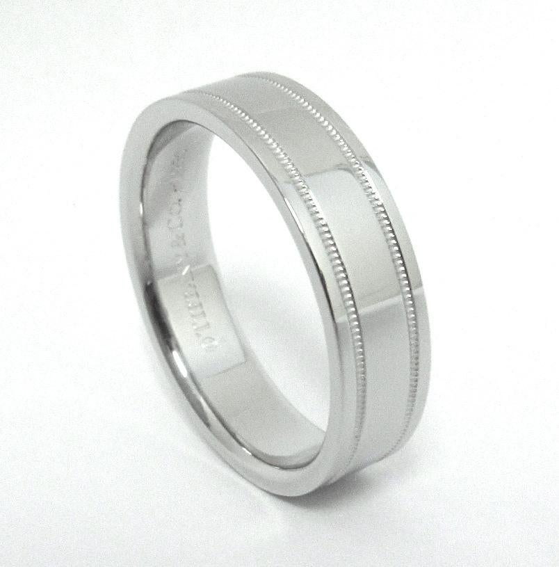 TIFFANY & Co. Together Platinum 6mm Double Milgrain Wedding Band Ring 10.5 Men's

 Metal: Platinum 
 Size: 10.5 
 Band Width: 6mm
 Weight: 14.80 grams
 Hallmark: ©TIFFANY&CO. PT950
 Condition: Excellent condition, like new. It comes with Tiffany