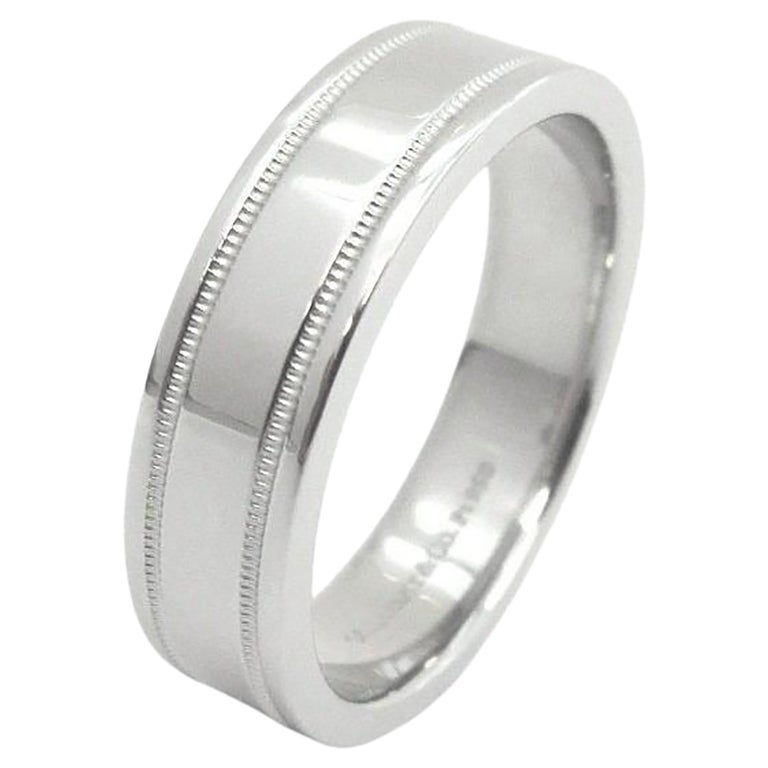 TIFFANY 
Co. Alliance en platine à double grain de millegrain 10.5