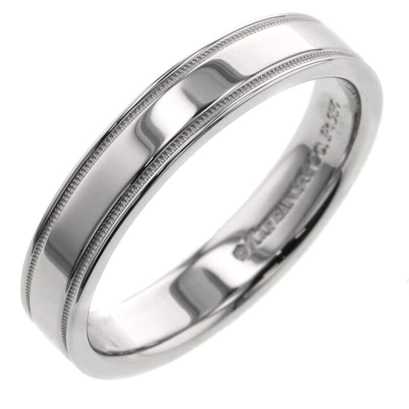 TIFFANY & Co. Together Platinum 4mm Double Milgrain Wedding Band Ring 9.5

 Metal: Platinum 
 Size: 9.5 
 Band Width: 4mm
 Weight: 7.40 grams
 Hallmark: ©TIFFANY&CO. PT950
 Condition: Excellent condition, like new
 Tiffany price: