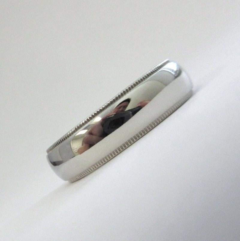 TIFFANY & Co. Together Platinum 6mm Milgrain Wedding Band Ring 9.5

 Metal: Platinum 
 Size: 9.5 
 Band Width: 6mm
 Weight: 14.70 grams
 Hallmark: ©TIFFANY&CO. PT950
 Condition: Excellent condition, like new

Authenticity guaranteed