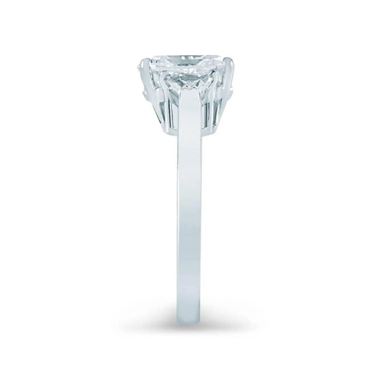 Tiffany & Co. 3ct Total Weight Platinum Radiant Brilliant Cut Diamond 3-Stone Engagement Ring.

The center stone is a Natural Radiant Brilliant Cut Diamond weighing 2.50 ct, D in color, VS1 clarity

There are two Triangular Brilliant Cut side