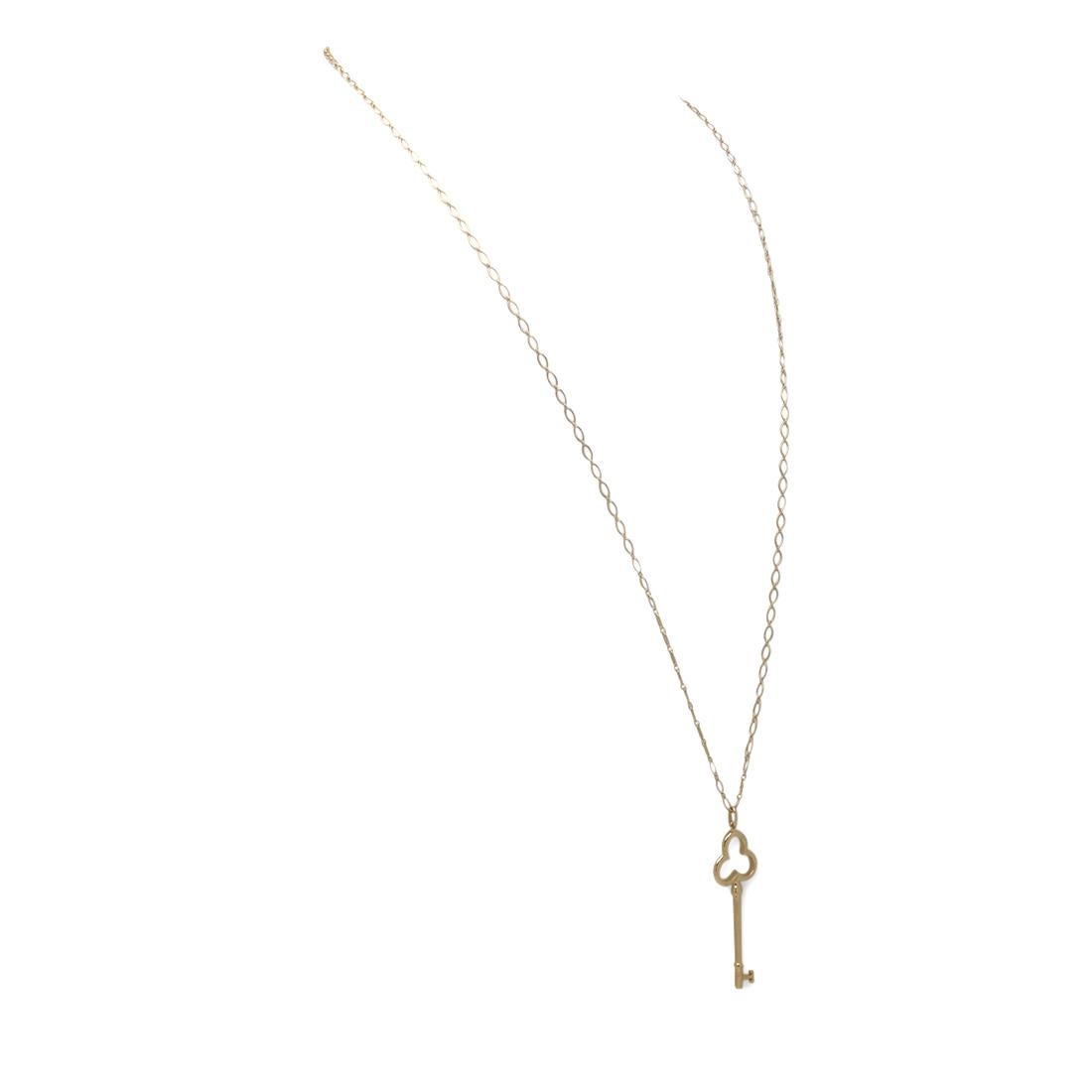 Tiffany & Co. Trefoil Key Yellow Gold Pendant Necklace In Excellent Condition In New York, NY
