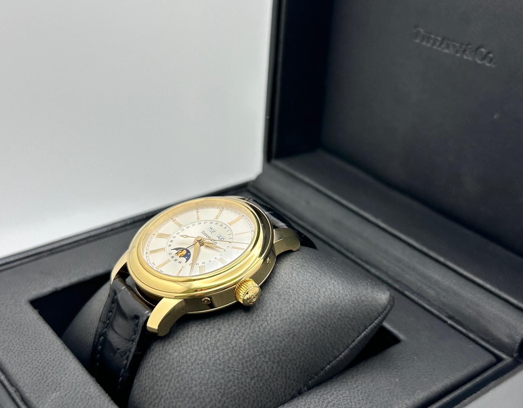 Tiffany & Co. Triple Calendar Moon Phase Watch 17042084 39mm 18k Gold Box Paper In Excellent Condition For Sale In San Diego, CA