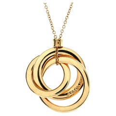 Tiffany & Co. Dreifache Kreis-Halskette mit Anhänger aus 18 Karat Gelbgold