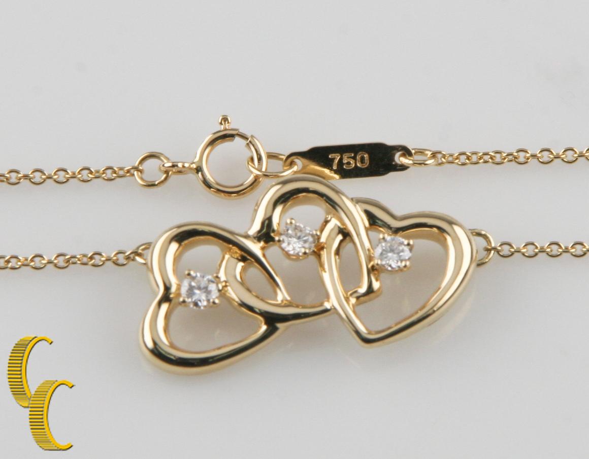 three heart gold necklace