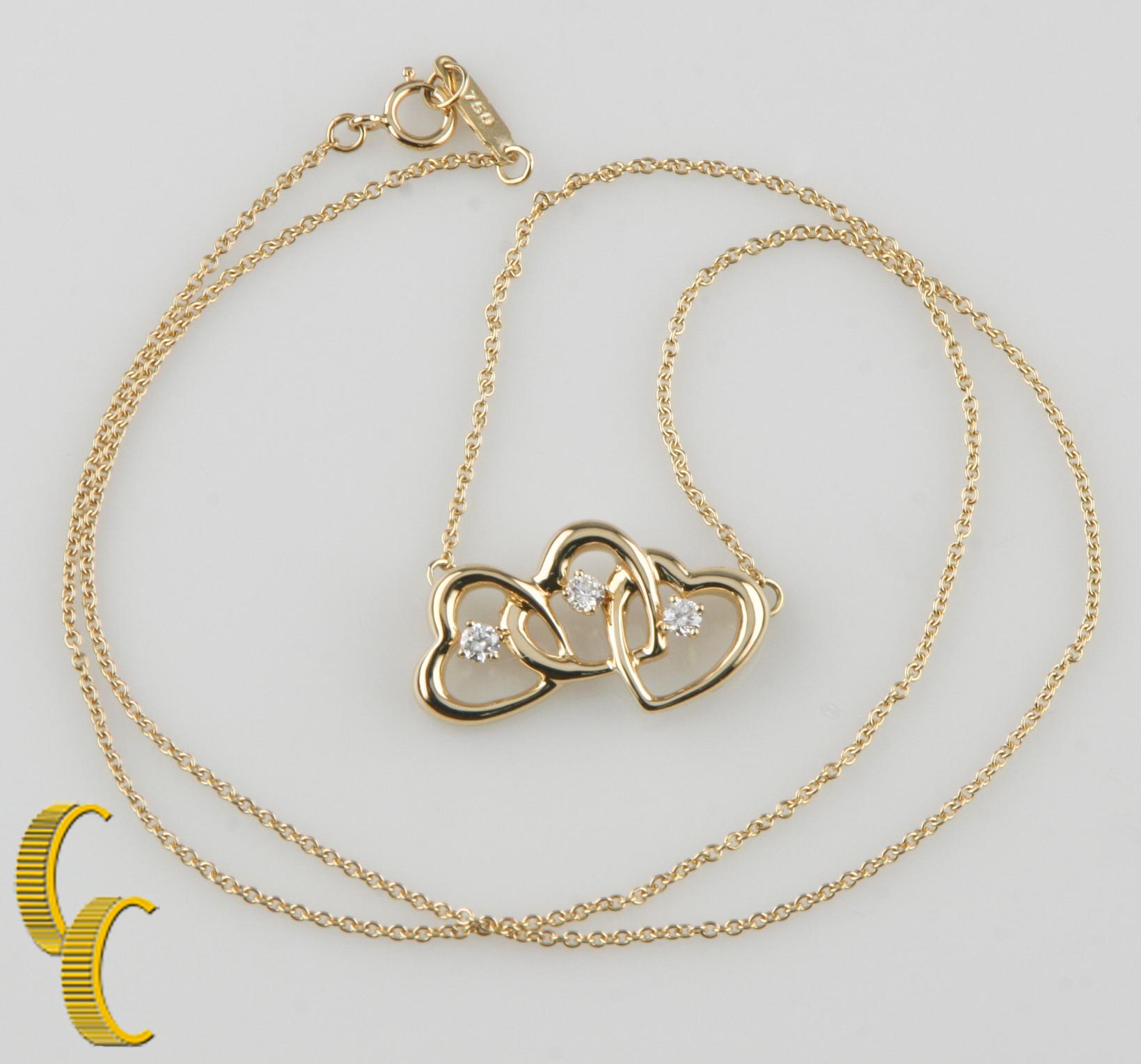 Tiffany & Co. Triple Heart Diamond 18 Karat Gold Pendant Necklace with Chain In Excellent Condition In Sherman Oaks, CA
