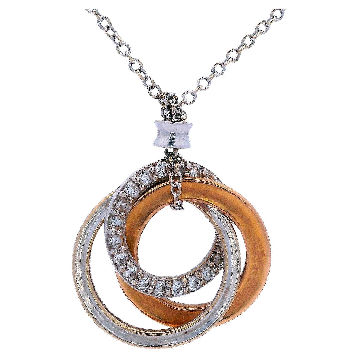 Tiffany 
Co. Triple interlocking Diamonds Necklace in 18kt Gold en venta