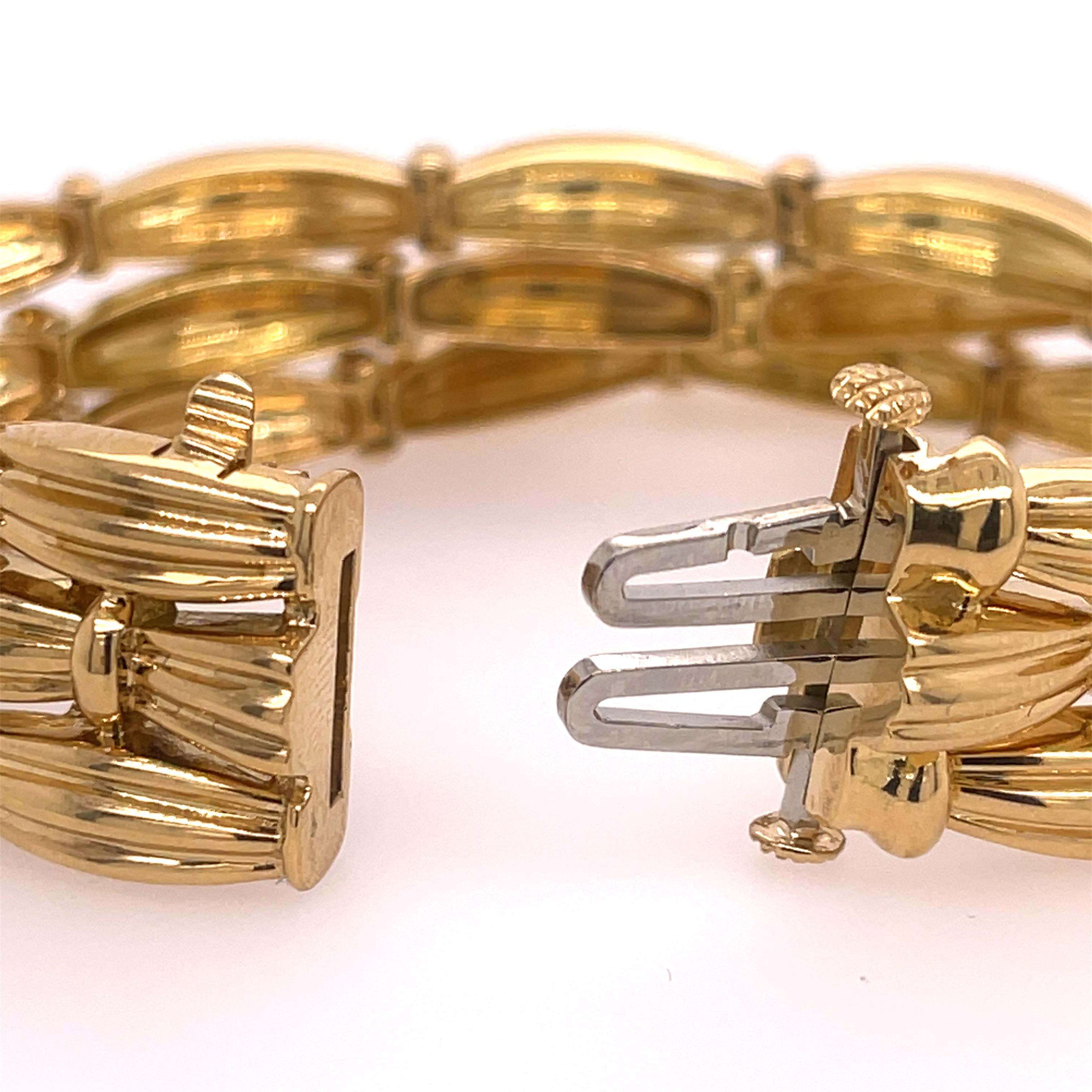 Tiffany & Co. triple row bracelet in 18k yellow gold. Stamped 1992 TIFFANY & CO 750.