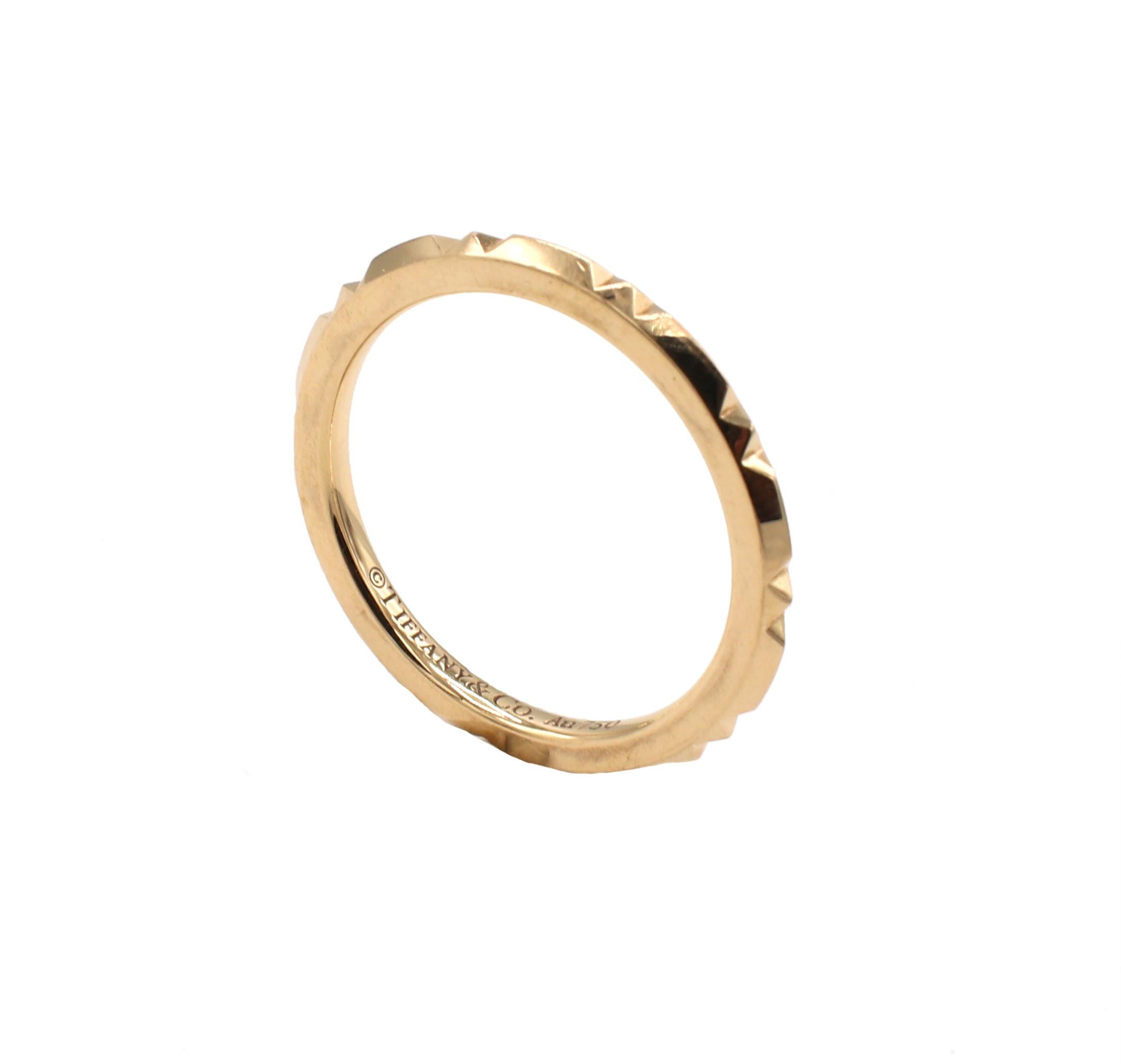 Tiffany & Co. True Collection 18 Karat Rose Gold Thin Band Ring

Metal: 18k rose gold
Weight: 1.93 grams
Size: 4 (US)
Width: 1.5mm
Signed: Tiffany & Co. Au750