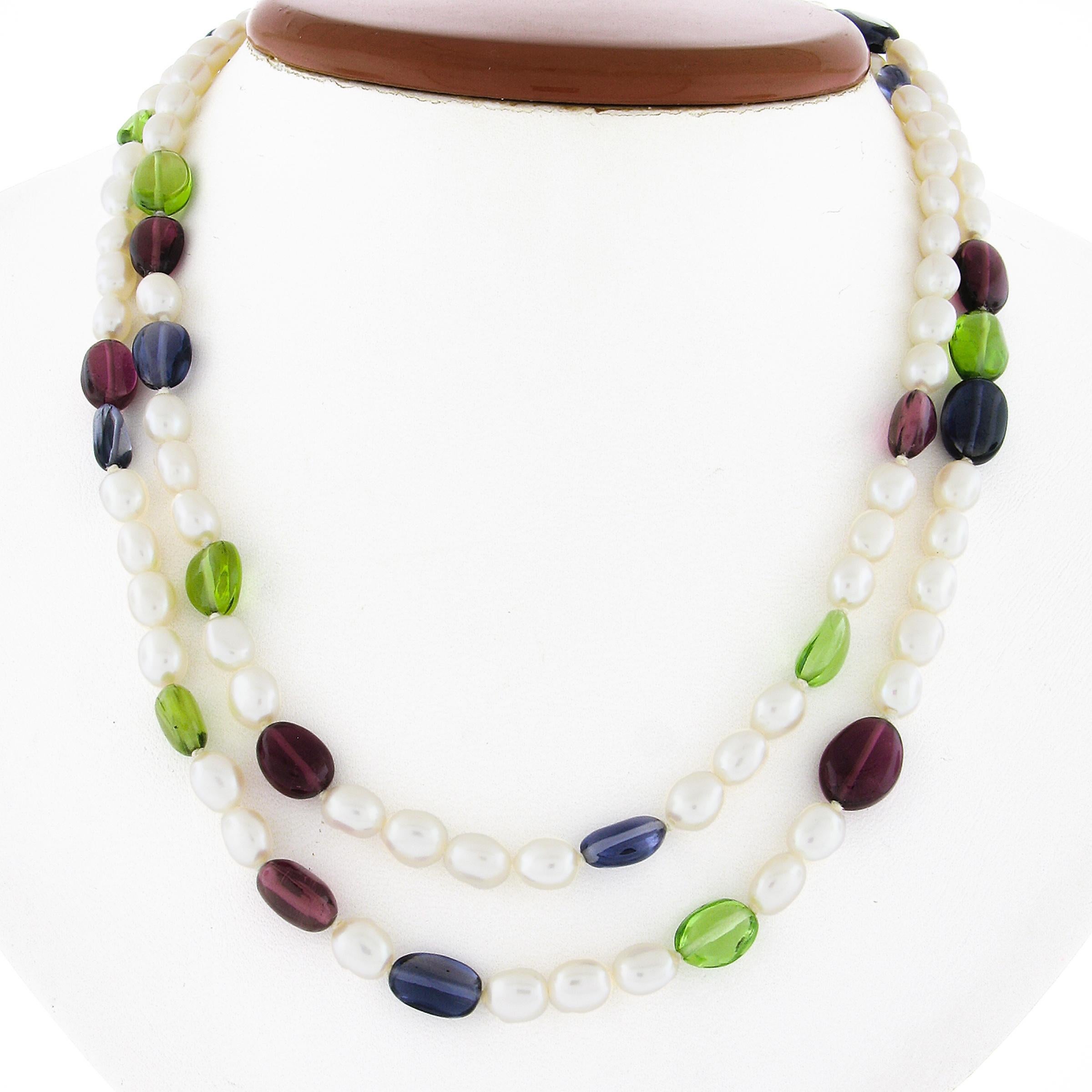 --Stone(s):--
110 Natural Genuine Peridots, Iolites, Pink Tourmalines & Cultured Pearls - Tumbled Shape - Strung - Green, Purple, Pink & White Color 

Material: String & Solid 18k White Gold Clasp & Tag
Weight: 40.62 Grams
Chain Type: Bead