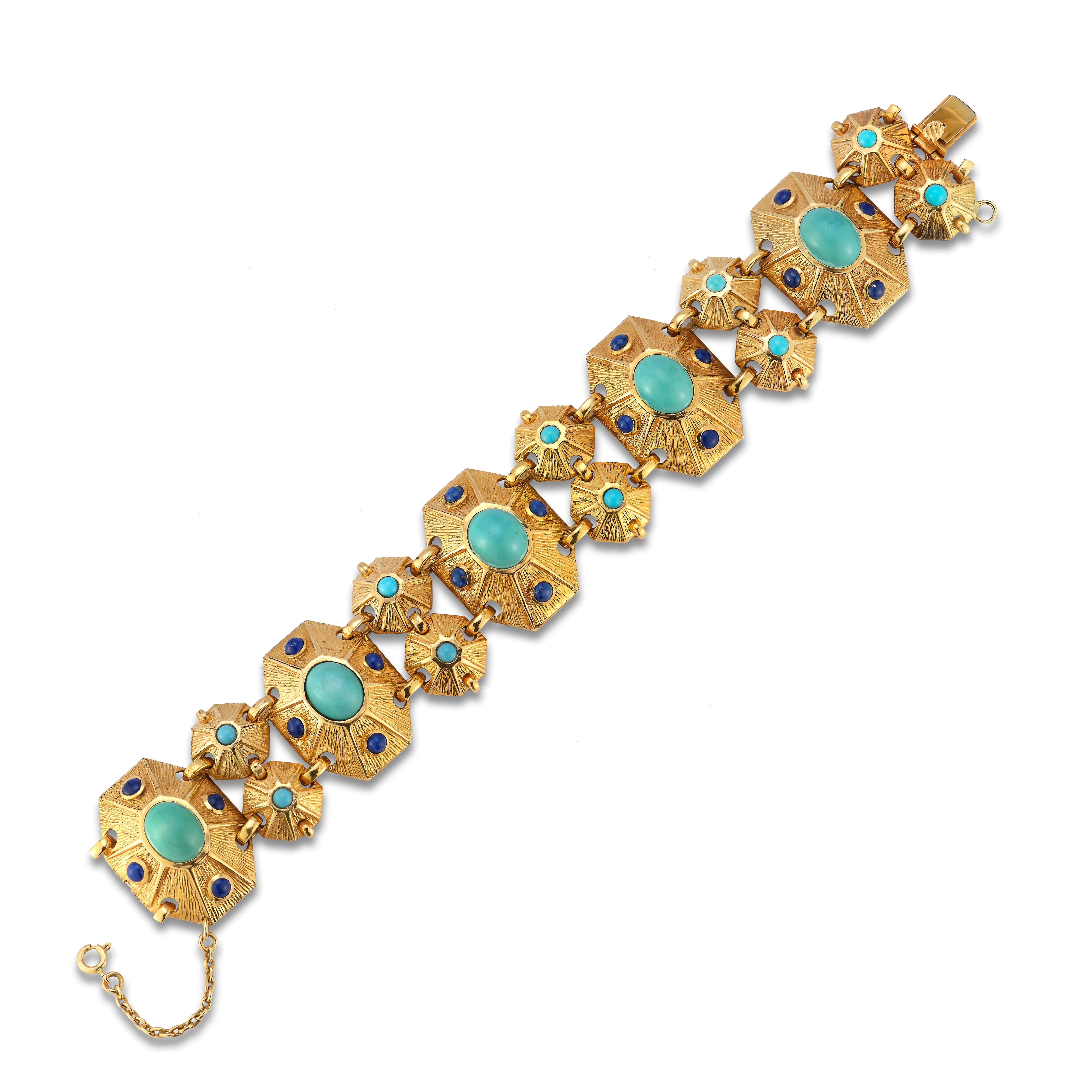 Tiffany & Co. Turquoise & Lapis Lazuli Bracelet -

An 18 karat gold link bracelet set with 5 large cabochon turquoise, 10 small cabochon turquoise and 20 small cabochon lapis lazuli

Measurements: 8.5