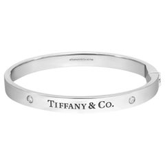 Tiffany & Co. Two Diamond Logo Hinged Bangle Bracelet 18K White Gold Size Medium