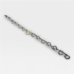 Tiffany & Co. Two Tone Heart link 7" Bracelet.