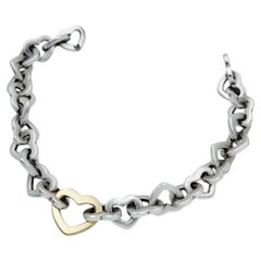 Tiffany & Co. Two Tone Heart link 7" Bracelet.