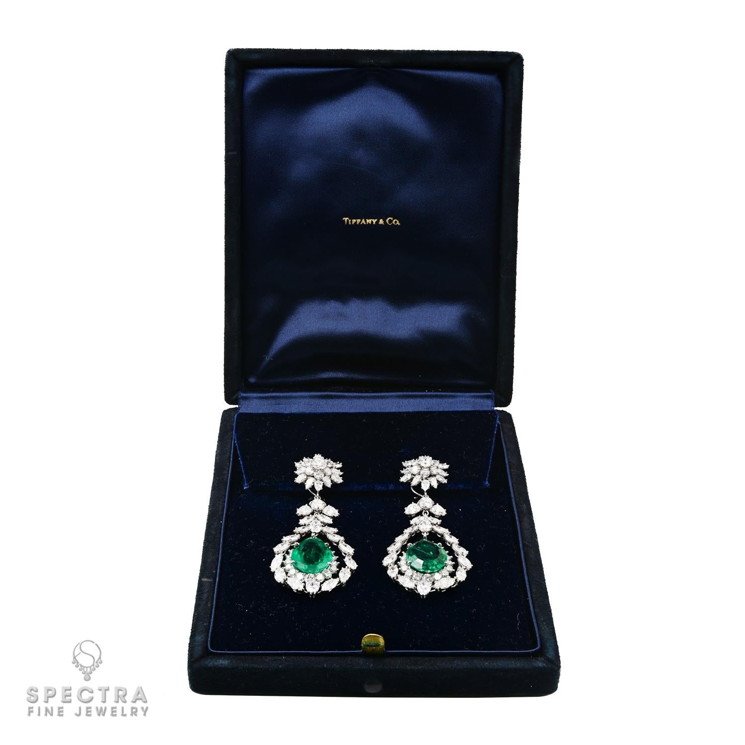 These exquisite drop earrings from Tiffany & Co. are a captivating masterpiece adorned with the rare beauty of Colombian emeralds and dazzling diamonds.

At the heart of each earring sits a resplendent pear-shaped Colombian emerald, weighing 8.58