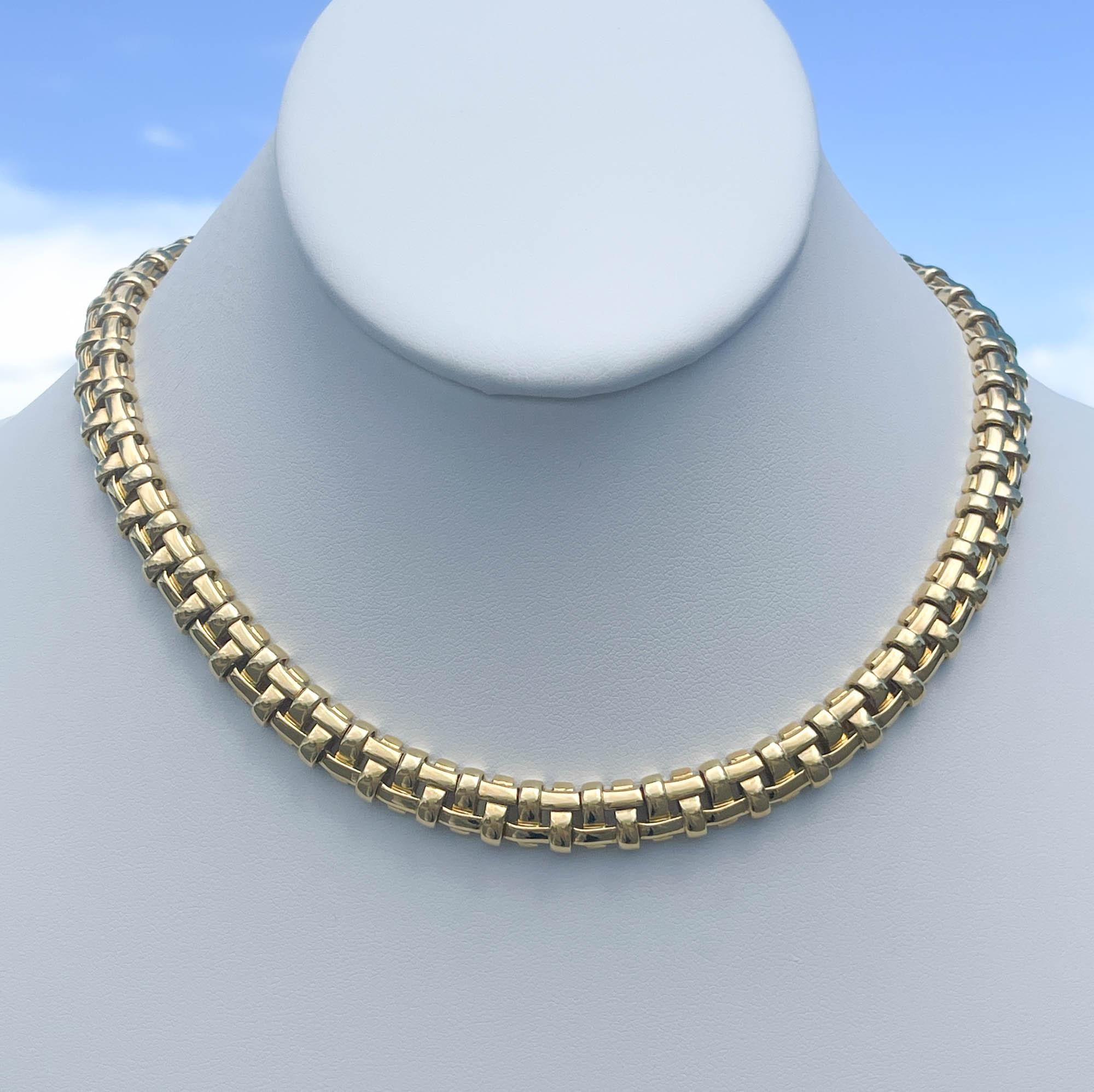 Tiffany & Co Vanerie 18k Yellow Gold Choker Necklace 
The necklace is 16 inches long and 9mm wide. 
Total weight of the necklace is 81.5 grams.
Hallmarks: 2002, T&CO, 750, ITALY.

Please view our photos and videos for more details.

Good vintage