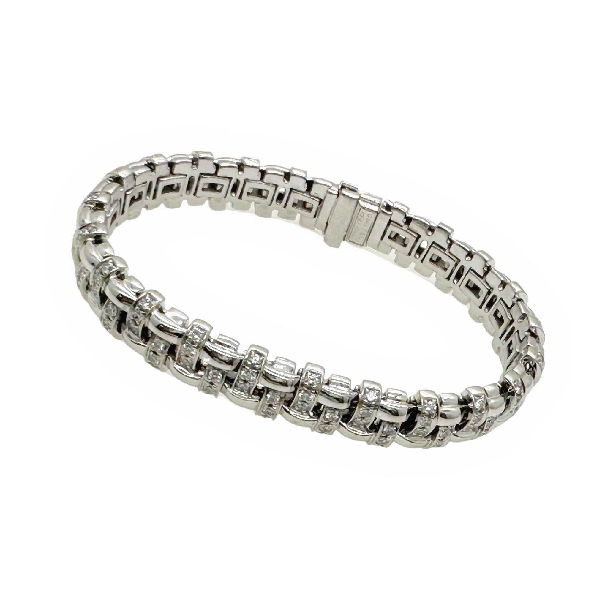 Tiffany & Co. Vannerie Collection Diamond Bracelet
Style:  Basket Weave
Metal:  18kt White Gold ~ 47 grams
Size / Measurements:  7' inches Length - 10 MM width
Main Diamond:  138 Round Brilliant Diamonds ~ 2.75 tcw
Hallmark:  ©2002 T&Co. Au 750