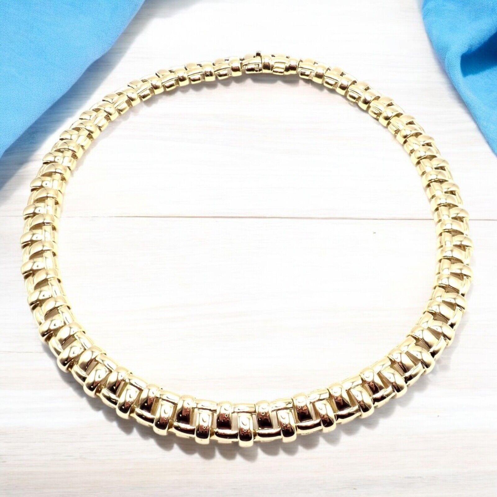 18k Yellow Gold Vannerie Basket Weave Necklace by Tiffany & Co.
This authentic Tiffany & Co. Vannerie necklace is a masterpiece of luxury and intricate design. Crafted from 18k yellow gold, it showcases a stunning basket weave pattern, a testament