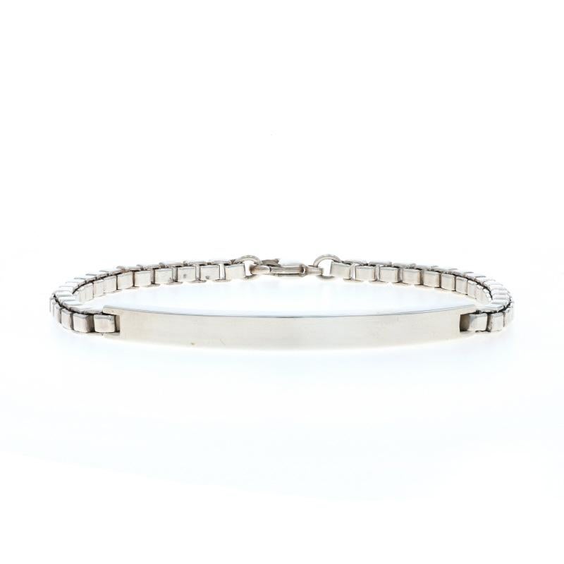 Brand: Tiffany 
Co.
Collection: Venetian
Design:  Box Chain ID Bracelet

Metal Content: Sterling Silver

Chain Style: Venetian Box
Fastening Type: Lobster Claw Clasp
Features: Engravable

Measurements

Chain Width: 5/32
