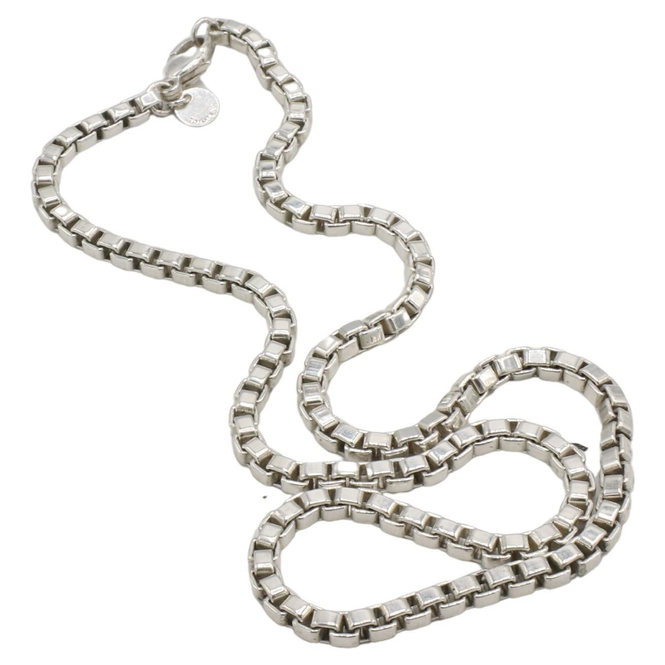 Tiffany & Co. Venetian Sterling Silver 4MM Box Link Chain Necklace 18 Inches 
Metal: Sterling silver 925
Weight: 38.28 grams
Length: 18 inches
Width: 4mm
OD F35000797

