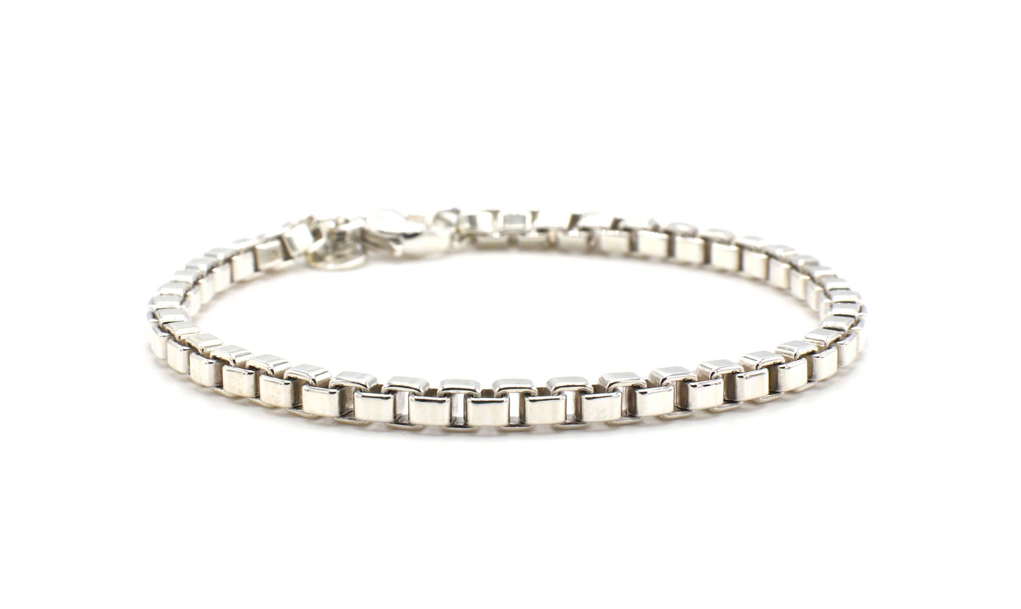 Tiffany & Co. Venetian Sterling Silver Box Link Bracelet

Metal: Sterling silver 925
Weight: 15.81 grams
Length: 7.5 inches
Width: 4mm
Signed: Tiffany & Co. 925