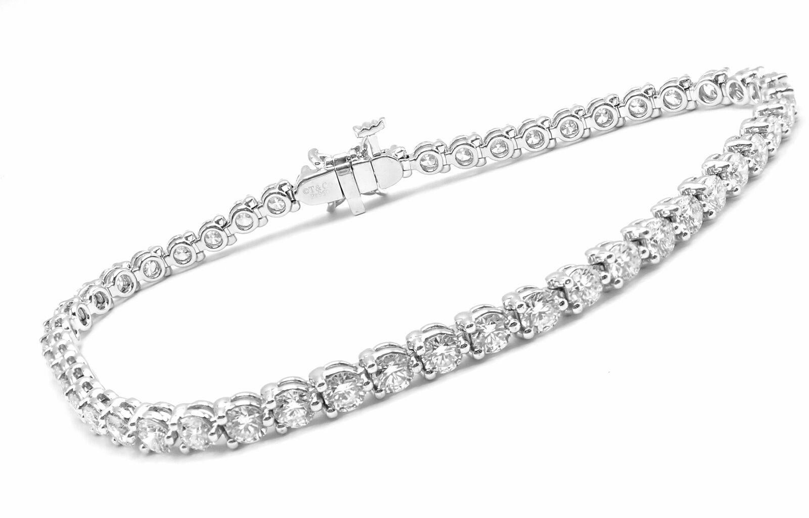 Platinum Diamond Line Tennis Bracelet by Tiffany & Co from Victoria collection.
With 47 round brilliant cut diamonds VS1 clarity, E color total weight approx. 4.24ct
4 marque cut diamonds .24ct
This bracelet comes with an appraisal from Tiffany & Co