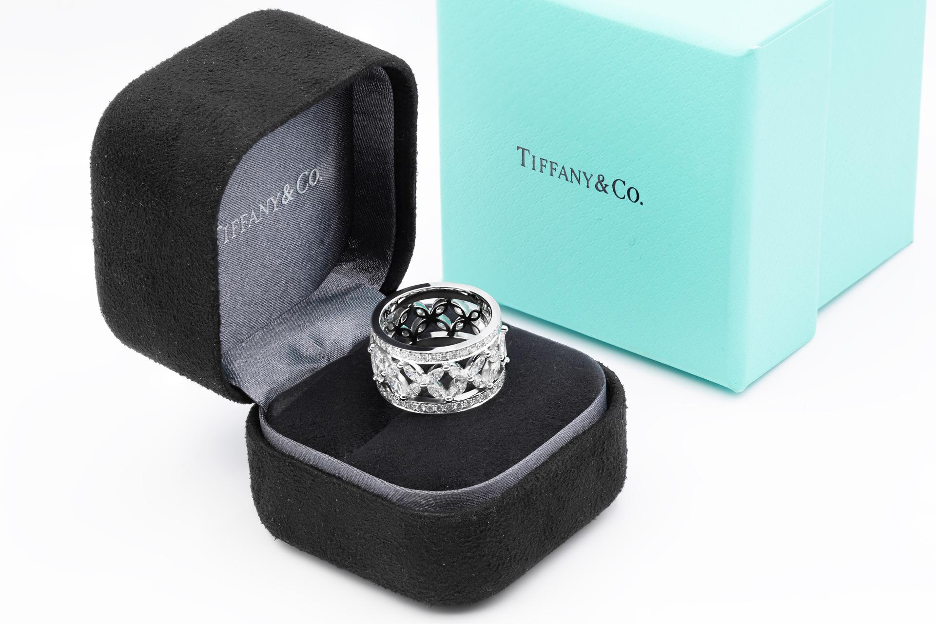 Tiffany & Co. Victoria Band Ring
Platinum with diamonds
Marquise diamonds, carat total weight 2.00
Round brilliant diamonds, carat total weight .34
Size 6.5 (not sizable)
Comes with inner and outer box (appraisal available upon request)
Ring is pe