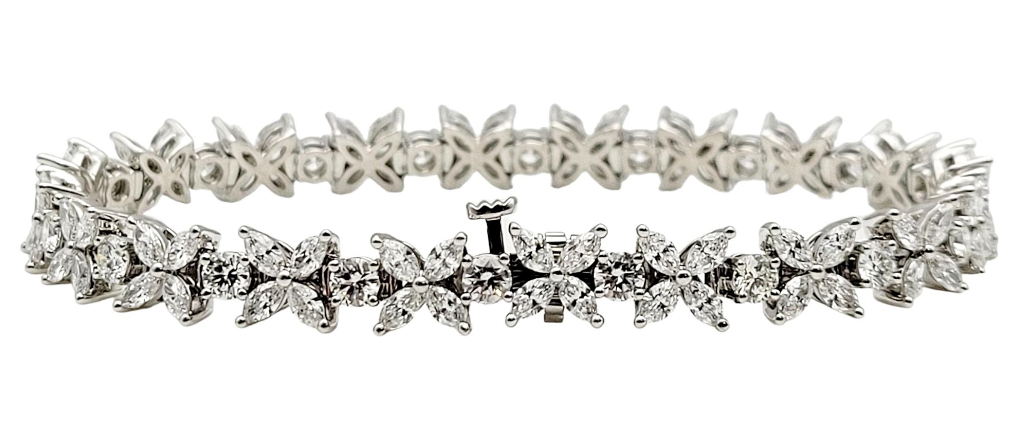 Elevate your designer jewelry collection with this exquisite Tiffany & Co. Victoria Cluster Diamond Tennis Bracelet. Founded in 1837 in New York City, Tiffany & Co. is one of the world's most storied luxury design houses recognized globally for its